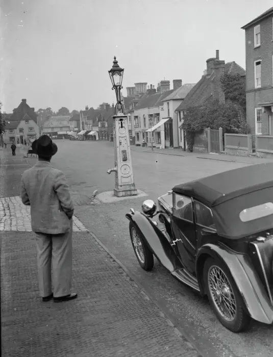 Framed Print : An old water pump used as a street lamp. West Malling. 14 September 1937 Framed Print : An old water pump used as a street lamp. West Malling. 14 September 1937
