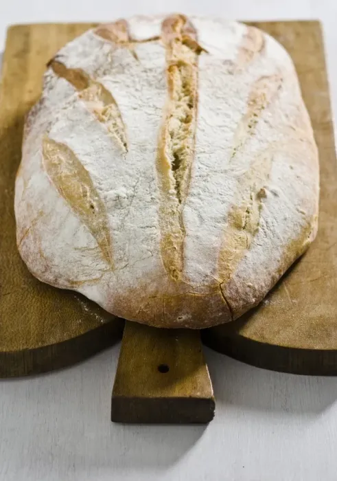 Framed Print : Organic rustic white loaf on wooden cutting board credit: Marie-Louise Avery / Framed Print : Organic rustic white loaf on wooden cutting board credit: Marie-Louise Avery /