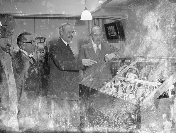 P. M. G. And Astronomer Royal Inaugurate Telephone Talking Clock. The Postmaster - general
