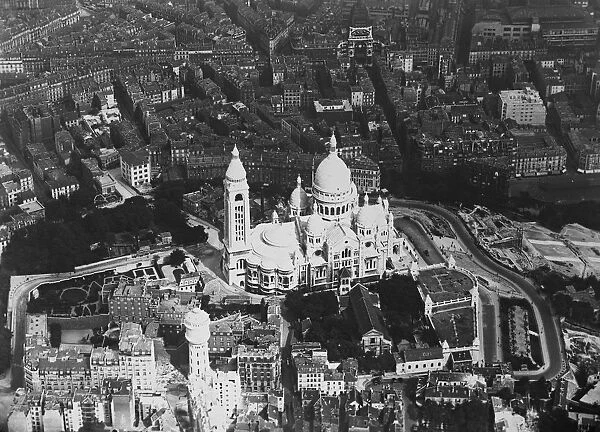Paris as seen from the air. Showing Montmartre with the Church of the Sacre Coeur