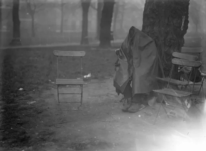 Framed Print : A pathetic scene in Londons cold. A human derelict. a women huddled beneath