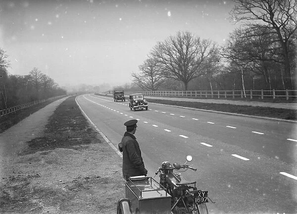 An a patrolman watching the traffic on the new Sidcup By - Pass. 1935