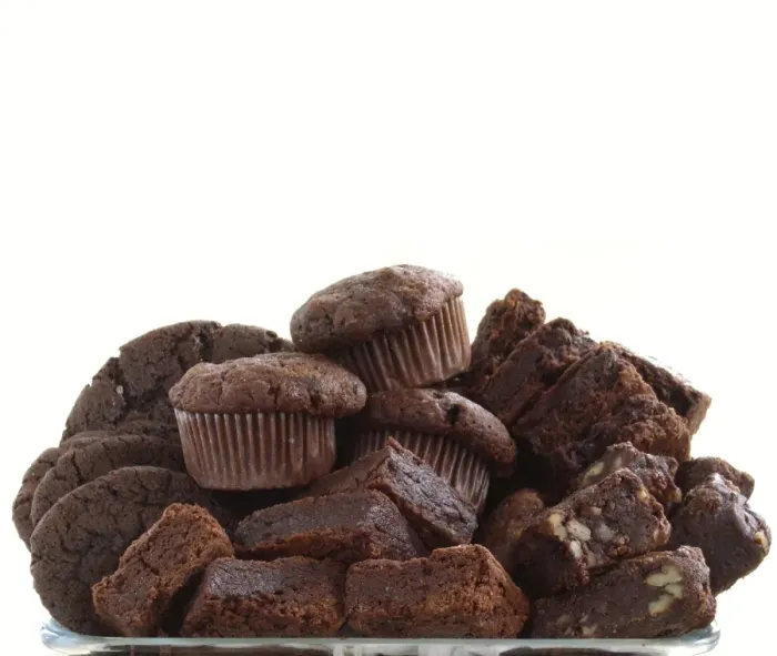 Framed Print : Pile of organic chocolate muffins and brownies credit: Marie-Louise Avery / thePictureKitchen Framed Print : Pile of organic chocolate muffins and brownies credit: Marie-Louise Avery / thePictureKitchen
