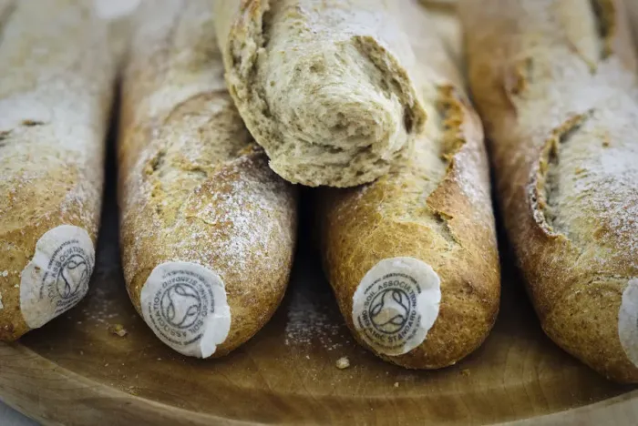 Framed Print : Pile of stoneground wholemeal organic baguettes on woden board credit: Marie-Louise Framed Print : Pile of stoneground wholemeal organic baguettes on woden board credit: Marie-Louise