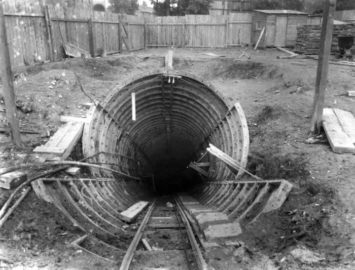 Framed Print : A pilot tunnel for the London Tube leading to the construction of an escalator tunnel