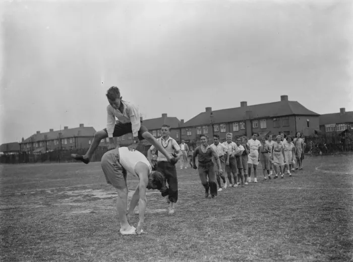 Framed Print : Play leadership. Penhill. Teamgames, leap frog. 1937 Framed Print : Play leadership. Penhill. Teamgames, leap frog. 1937