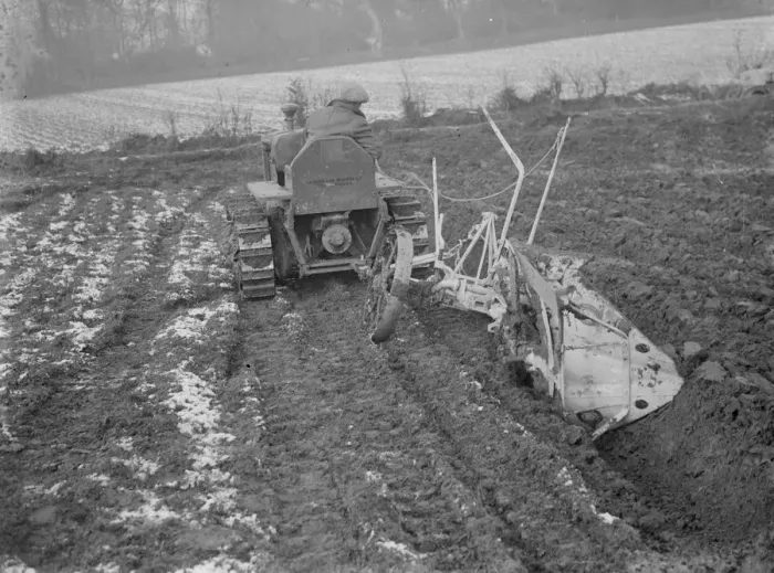 Framed Print : A ploughing demonstration with the new Melotte tractor fitted with continuous tracks