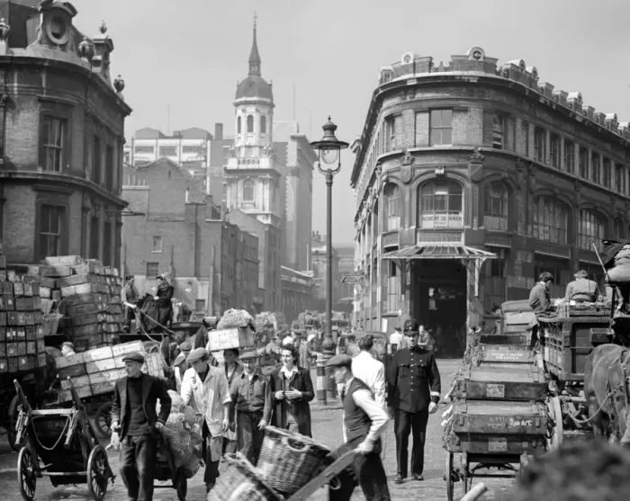 Framed Print : A policeman walks his beat with the fish porters, traders and barrow boys in Billingsgate