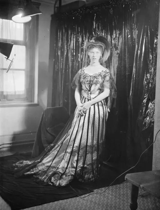 Framed Print : Preparations for Hairdressing Through the Ages Exhibition. M Adolphe model Miss