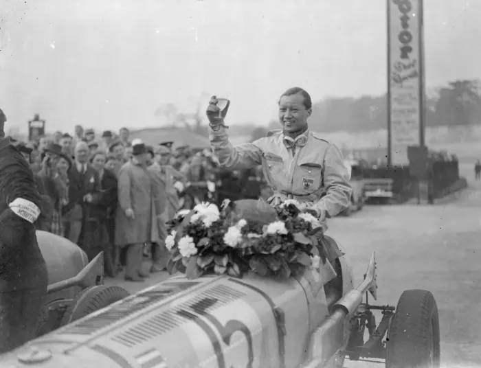 Framed Print : Prince Bira wins international trophy race. Prince Birs of Siam driving an E R