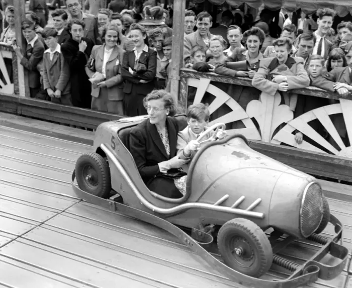 Framed Print : Princess Edward of Kent in a dodgem Car with his nanny at Agars Plough Slough. August Framed Print : Princess Edward of Kent in a dodgem Car with his nanny at Agars Plough Slough. August