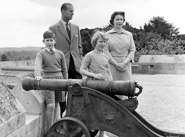 The Queen Elizabeth II with her family at Windsor Castle on the East Terrace looking