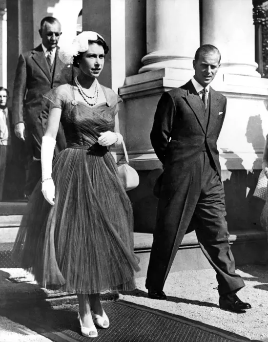 Framed Print : Queen Elizabeth II wearing a frock of rich royal blue nylon net with a closely pleated shirt Framed Print : Queen Elizabeth II wearing a frock of rich royal blue nylon net with a closely pleated shirt