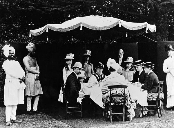 Queen Victoria at breakfast in Osbourne Gardens with the Duke of Connaught Princess Beatrice