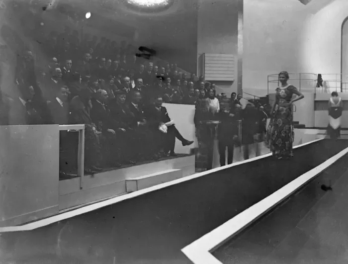 Framed Print : Queen watches fashion parade at British textile exhibition. The Queen, accompanied Framed Print : Queen watches fashion parade at British textile exhibition. The Queen, accompanied