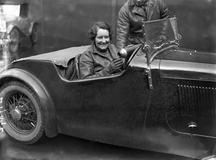 Framed Print : RAC Bournemouth rally, Miss Fay Taylor having a hot drink at the wheel of her car Framed Print : RAC Bournemouth rally, Miss Fay Taylor having a hot drink at the wheel of her car