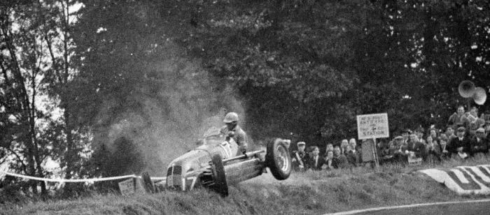 Framed Print : Racing car flies off the track - England TopFoto