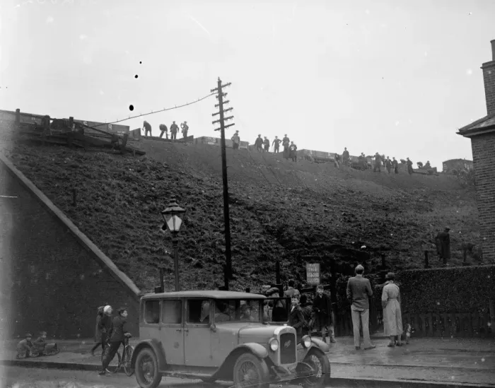 Framed Print : Rail workers work to clear the land slide and re lay track on the Wellhall line Framed Print : Rail workers work to clear the land slide and re lay track on the Wellhall line