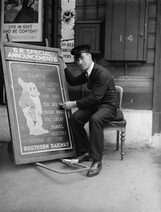 Framed Print : Railway porter sign writer Mr E A Burgar. 1938 Framed Print : Railway porter sign writer Mr E A Burgar. 1938