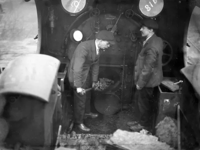 Framed Print : Railway scenes. Fireman stoking 28 January 1924