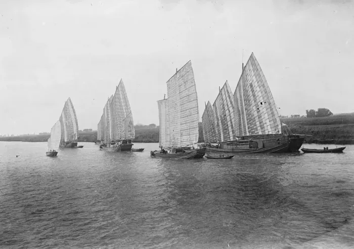 Framed Print : A recent picture from China showing a group of junks making their way up the Yangtze River Framed Print : A recent picture from China showing a group of junks making their way up the Yangtze River