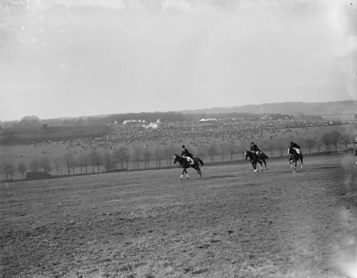 Framed Print : Riders canter across the field with the view of the R A Woolwich point to point in Framed Print : Riders canter across the field with the view of the R A Woolwich point to point in