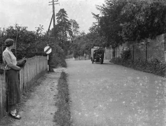 Framed Print : Road with a traffic sign at Farningham, Kent. 1935 Framed Print : Road with a traffic sign at Farningham, Kent. 1935