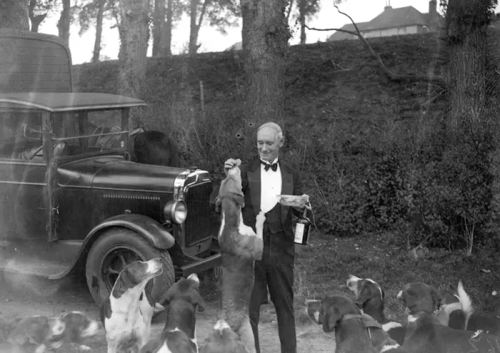 Framed Print : The Royal Artillery (RA) Drag hunt at Green St Green, Kent. Feeding the hounds. 1934