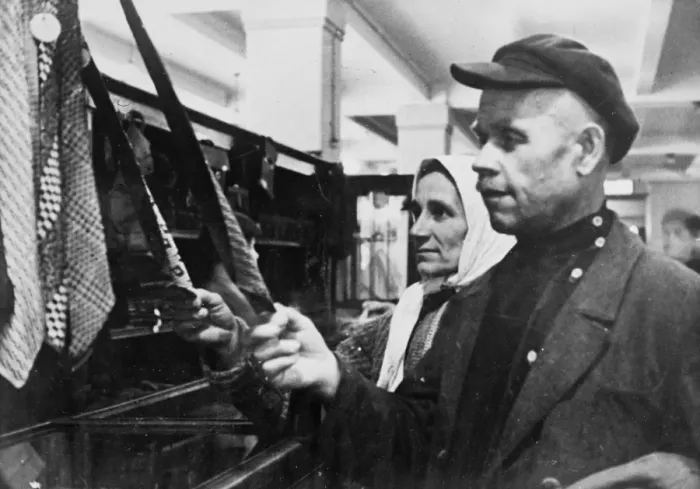 Framed Print : A Russian couple buying ties. 1934 Framed Print : A Russian couple buying ties. 1934