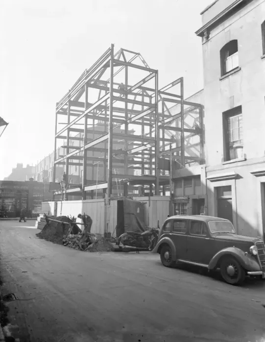 Framed Print : Scaffolding frame for the new flats on Earl Courts road, West London. 3 March 1938 Framed Print : Scaffolding frame for the new flats on Earl Courts road, West London. 3 March 1938