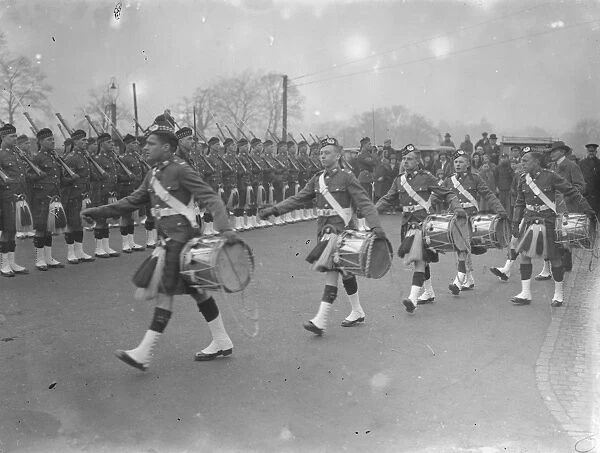 The scene at Farnborough, Hampshire on the return of the drums of the Gordons from Germany