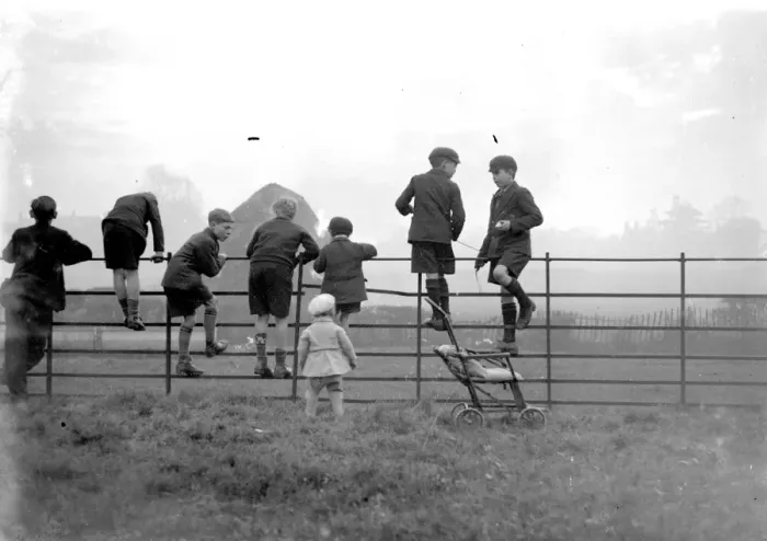 Framed Print : Schoolboys playing on a fence in the country. 1933 Framed Print : Schoolboys playing on a fence in the country. 1933