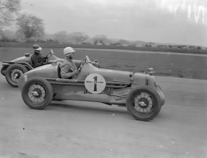 Framed Print : Seaman driving single handed, wins British Empire road race. Driving witout relief Framed Print : Seaman driving single handed, wins British Empire road race. Driving witout relief