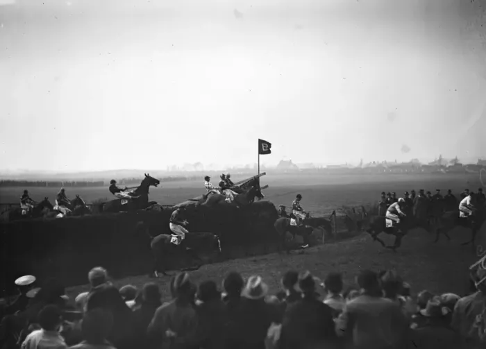 Framed Print : Sensational Grand National. Some of the field taking the famous Bechers Brook Framed Print : Sensational Grand National. Some of the field taking the famous Bechers Brook