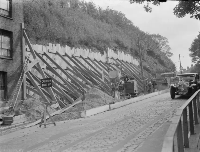 Framed Print : Shoring up a landslide with wooden braces in Dartford, Kent. 1938