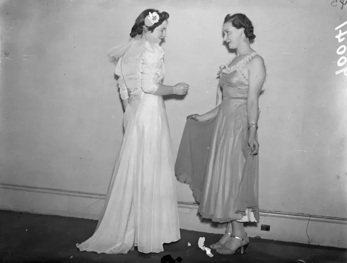 Framed Print : In the short evening dress fraction compared with a more flowing model. Exquisite gowns Framed Print : In the short evening dress fraction compared with a more flowing model. Exquisite gowns