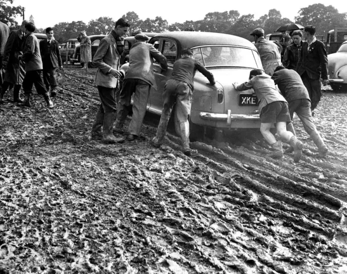 Framed Print : There was no shortage of help at the end of the day when several cars were bogged in mud Framed Print : There was no shortage of help at the end of the day when several cars were bogged in mud