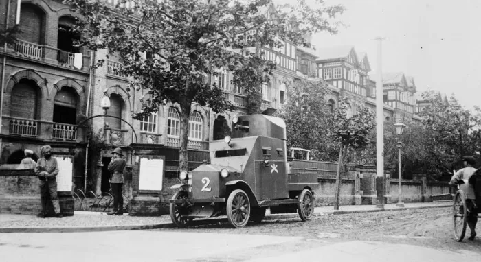 Framed Print : The situation in China. A British armoured car on duty in a street at Shanghai