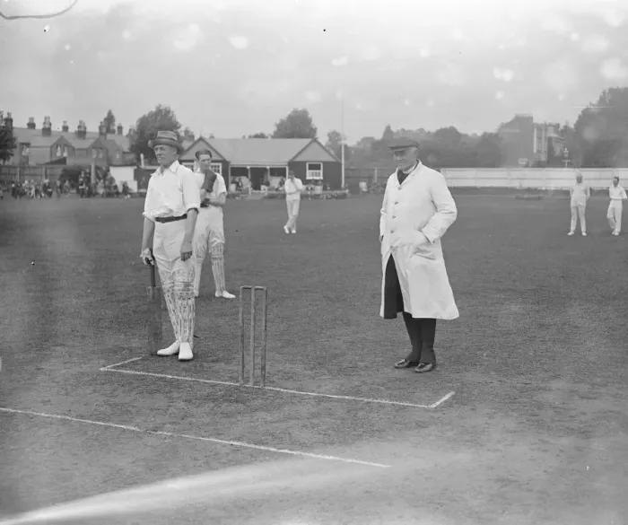 Framed Print : Slough Police versus Clergy Cricket Match The Bishop of Buckingham umpiring, batsmen Framed Print : Slough Police versus Clergy Cricket Match The Bishop of Buckingham umpiring, batsmen