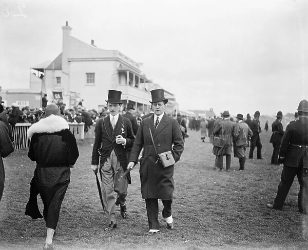 Society at Epsom on Oaks day. Lord Portarlington ( right ) with a friend. 8 June 1923