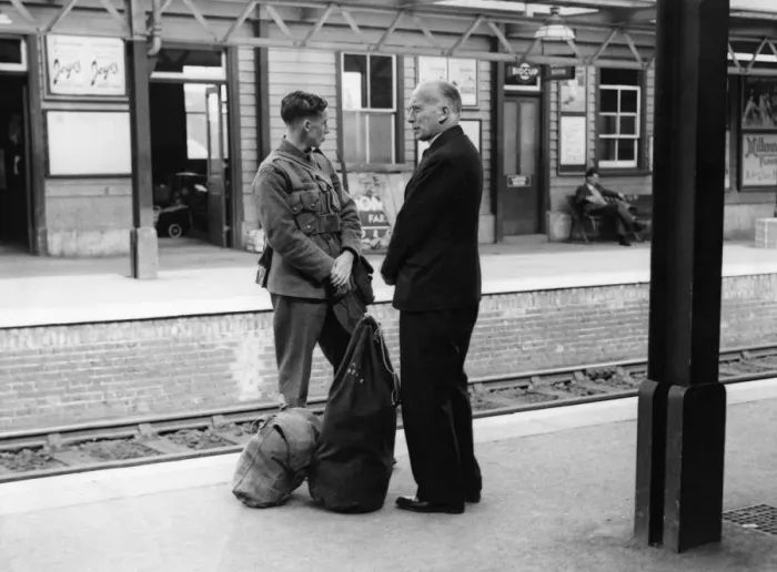 Framed Print : A soldier on his way to his unit. His father waits to say goodbye on Sidcup station