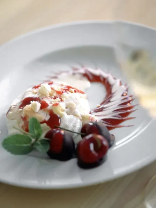 Framed Print : Sophisticated dessert of portion of cherry pavlova with cherries dipped in chocolate