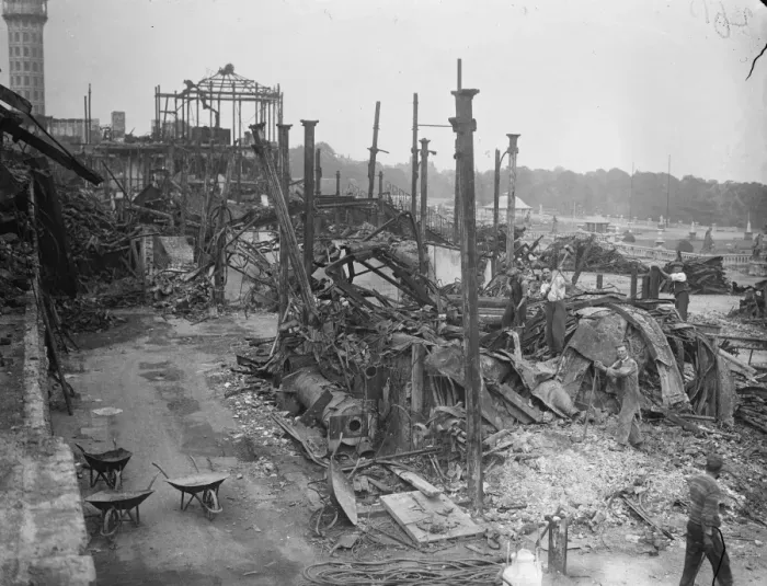 Framed Print : Sorting out the Crystal Palace remains. The twisted, flame scarred remains of