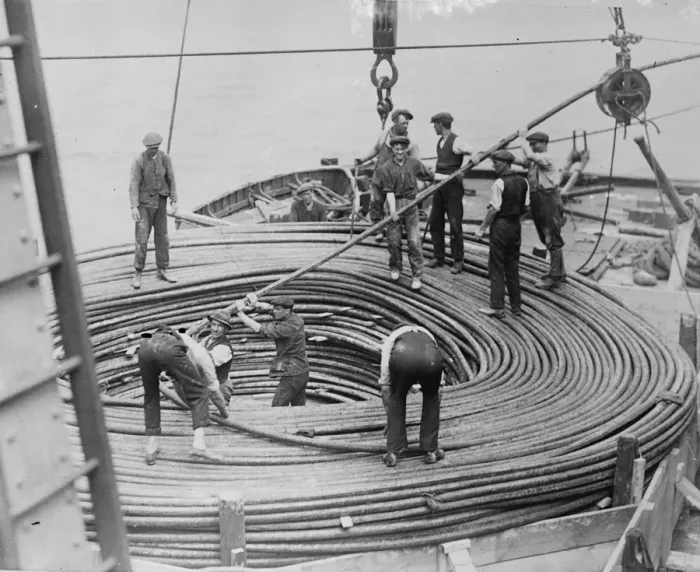 Framed Print : Ss Faraday takes seven miles of shore end cable in preparation to the start of Framed Print : Ss Faraday takes seven miles of shore end cable in preparation to the start of