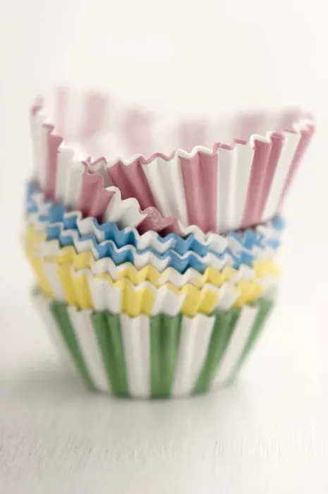 Framed Print : Stack of candy striped muffins cases credit: Marie-Louise Avery / thePictureKitchen Framed Print : Stack of candy striped muffins cases credit: Marie-Louise Avery / thePictureKitchen