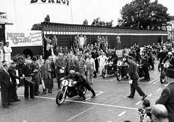 The start of the Senior TT trophy race at the Isle of Man. H L Daniell, is first to start