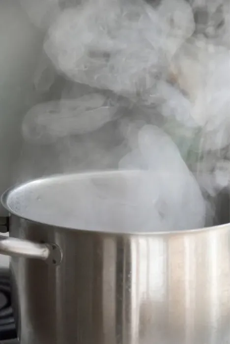 Framed Print : Steam from water boiling in stainless steel saucepan on hob credit: Marie-Louise