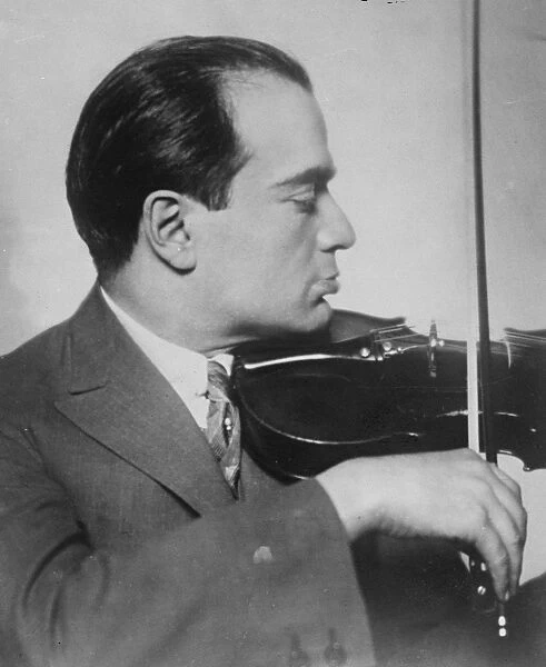 Stolen violin returned. M Bronislaw Huberman, the well known Polish violinist
