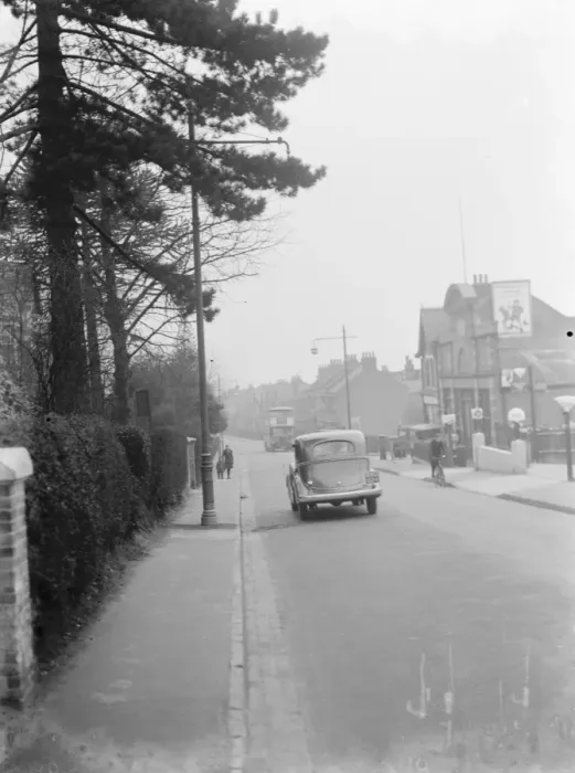 Framed Print : A street light which is shrouded by branches in Sidcup, Kent. 1937