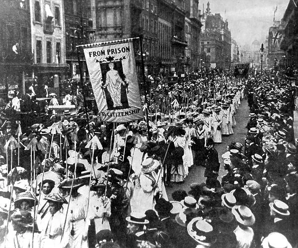 Suffragettes demonstrating in London. The wands they carry 617 are one for each conviction